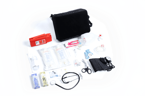 An Emergency Medical Kit (EMK) with its contents displayed.