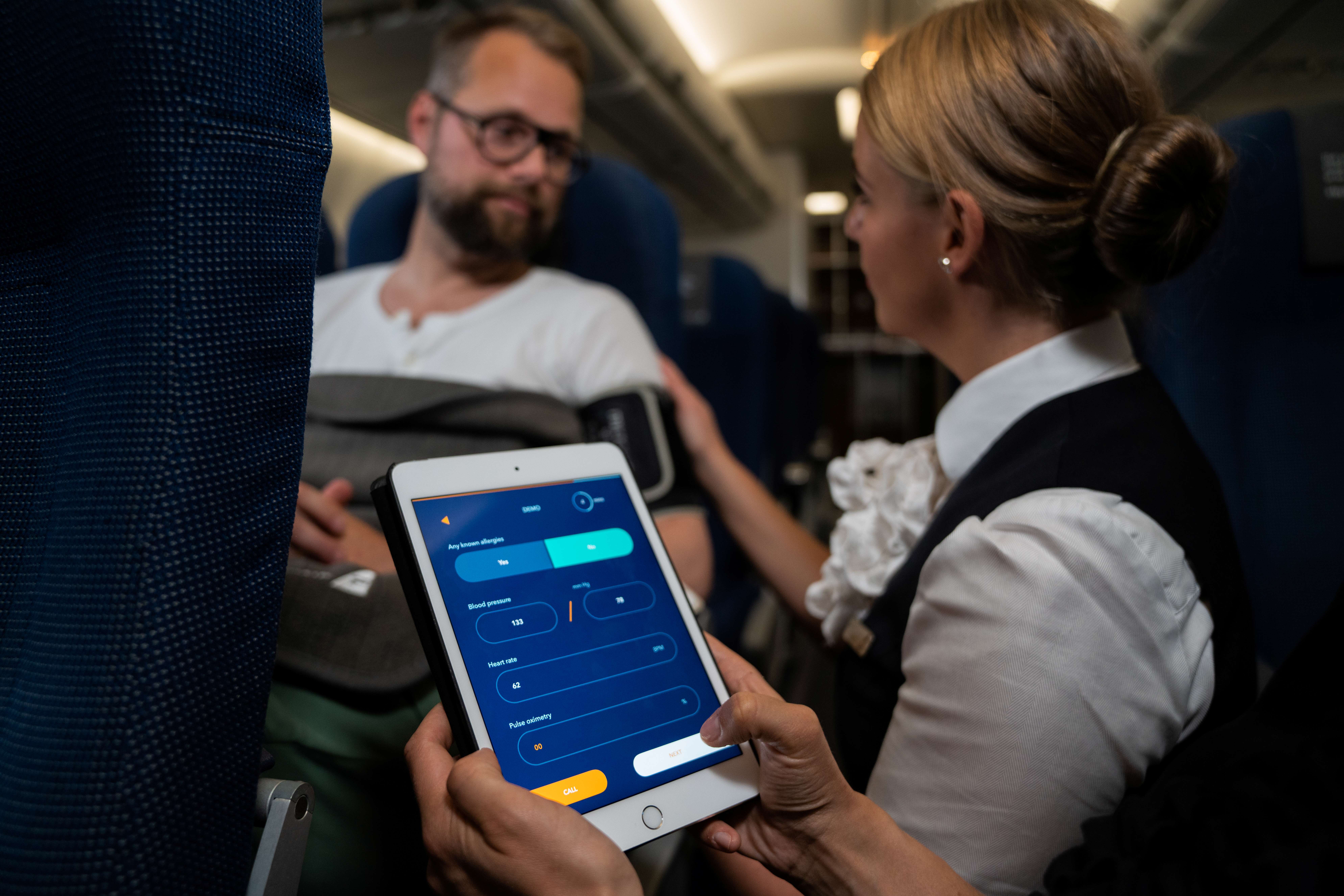 Cabin-Crewmember-Using-MedAire-Inflight-App