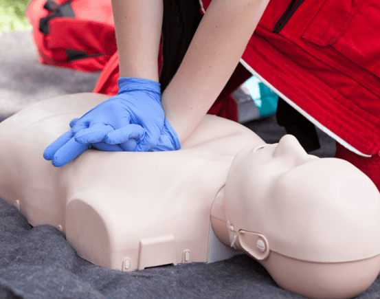 CPR training with a medical manikin.
