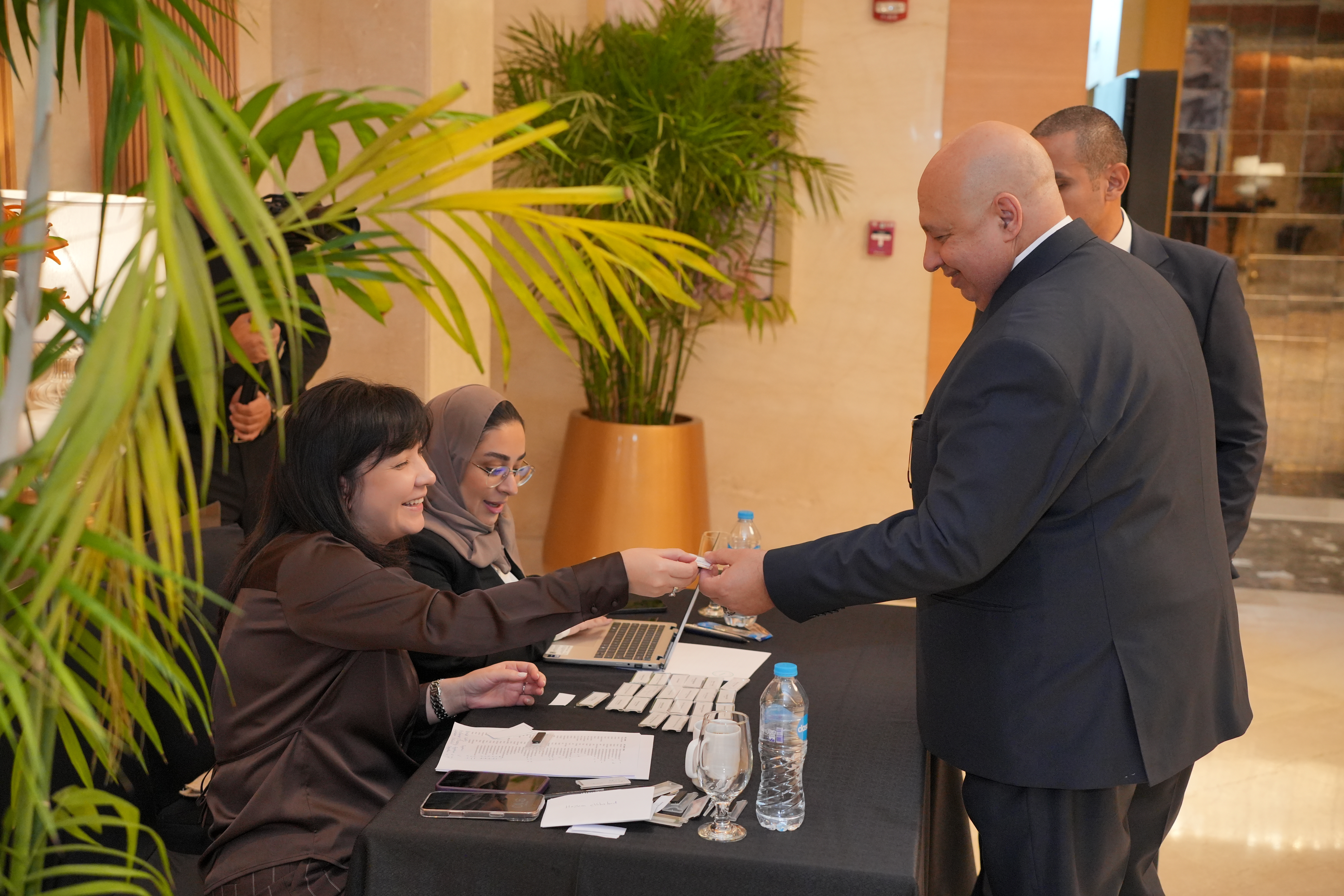 Shouq and Nigina greeting guests